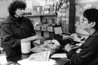 Image of sheet 19960130 photo 29: © 1996, Olivia Heussler / www.clic.li
Im bargeldlosen Einkaufsladen.  Kibbutz Yasuur. Israel 1996

Store without cash. Only by credit. √ Women talking shop food

Yas'ur (Hebrew: יַסְעוּר, lit. petrel) is a kibbutz in northern Israel. Located east of Acre in the Western Galilee, it falls under the jurisdiction of Mateh Asher Regional Council. In 2006 it had a population of 287.

The kibbutz was established in 1949 by immigrants from England and Hungary who were members of the Zionist Socialist youth movement Hashomer Hatzair