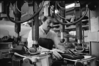 Image of sheet 19960350 photo 13: Worker in a shoe factory when polishing shoes
