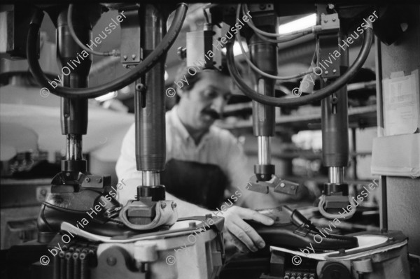 Image of sheet 19960350 photo 13: Worker in a shoe factory when polishing shoes