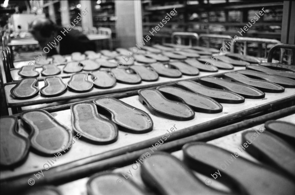 Image of sheet 19960350 photo 27: Worker in a shoe factory when polishing shoes