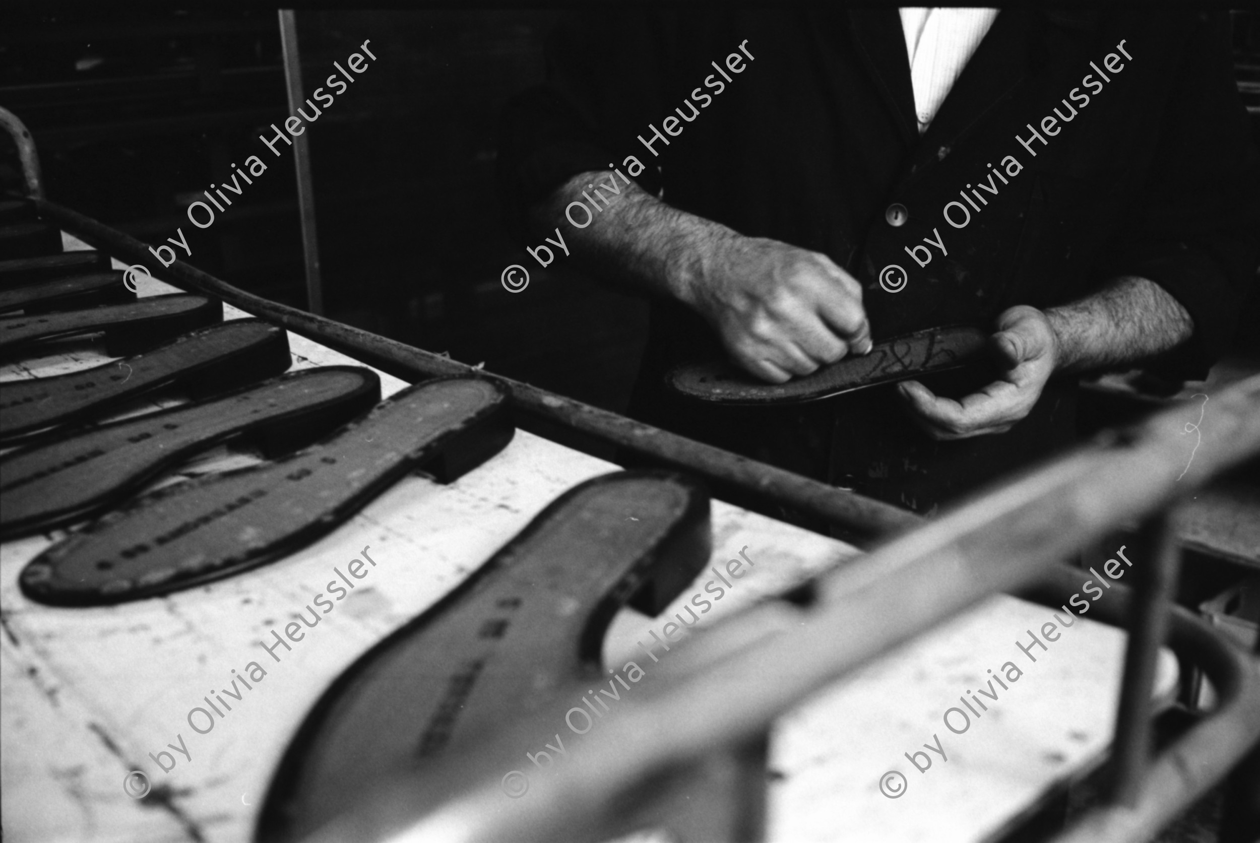 Image of sheet 19960350 photo 30: Worker in a shoe factory when polishing shoes