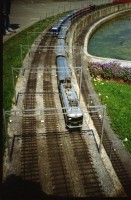 Image of sheet 19970040 photo 6: Swiss Miniature in Melide mit Polin Zug kompositionen Gleis Bahnhof Longines IKRK Genf Hauptsitz Polin Grossmünster EidechseBotta Zelt 1991