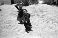 Image of sheet 20010070 photo 17: Mehr Abad Quetta, Baluchistan Pakistan 2001

Hazara Boys twins are playing. 
Zwei
Hazāra (Persian: هزاره‎) are a Persian-speaking people who mainly live in central Afghanistan. They are overwhelmingly Twelver Shia Muslims and comprise the third largest ethnic group of Afghanistan, forming about 9% (according to other sources up to 19%) of the total population. More than 650,000 Hazara live in neighbouring Pakistan (mostly settled in Quetta) and an estimated one million in Iran.willinge spielen.
 
Belutschistan (persisch ‏بلوچستان‎) ist eine Region im Iranischen Hochland, die sich über den Osten Irans, den Süden Afghanistans und den Südwesten Pakistans erstreckt. Die Fläche beträgt etwa 300.000 km². √

ONE TIME NON EXCLUSIVE EDITORIAL RIGHTS ONLY- NO ARCHIVING-NO THIRD PARTY DISTRIBUTION

© 2001, by OLIVIA HEUSSLER / www.clic.li