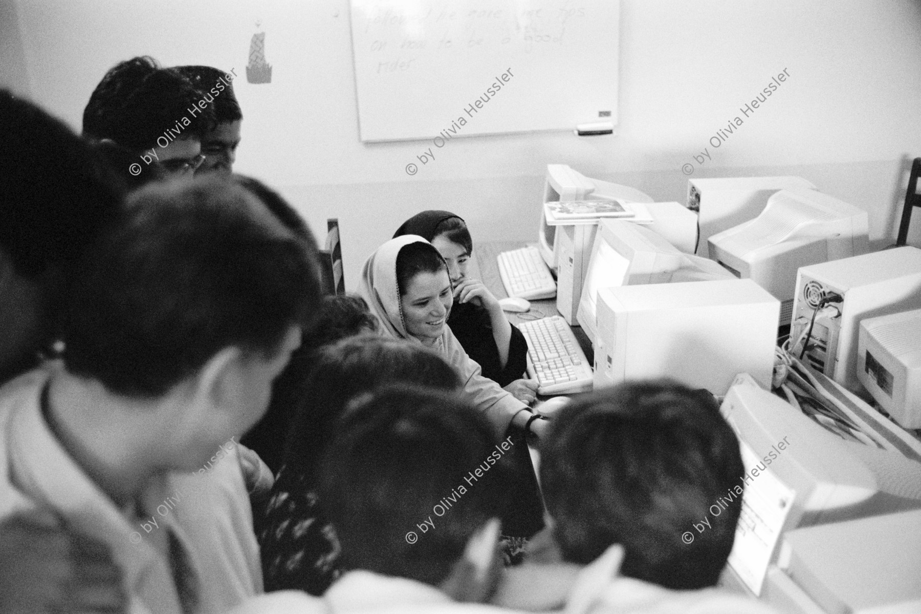 Image of sheet 20010072 photo 34: Pakistan Quetta

Zwei Frauen unter vielen Männern besuchen die Kurse am Computer PC in der Schule.

Die afghanische Aerztin Dr. Sima Samar ist Hazara, arbeitet in ihrer Shuada Organisation und unterstützt Hazara Flüchtlinge aus Afghanistan im Unterricht auf Computern. Die Schuhe bleiben draussen vor der Türe.

Balochistan (Balochi: بلوچستان) or Baluchistan[1] (lit. Land of the Baloch) is an arid, desert and mountainous region on the Iranian plateau in south-western Asia, northwest of the Indian Ocean near the Persian Gulf. It mainly includes southwestern Pakistan, southeastern Iran and a smaller section of southwestern Afghanistan.

Belutschistan (persisch ‏بلوچستان‎) ist eine Region im Iranischen Hochland, die sich über den Osten Irans, den Süden Afghanistans und den Südwesten Pakistans erstreckt. Die Fläche beträgt etwa 300.000 km². √

ONE TIME NON EXCLUSIVE EDITORIAL RIGHTS ONLY- NO ARCHIVING-NO THIRD PARTY DISTRIBUTION

© 2001, by OLIVIA HEUSSLER / www.clic.li