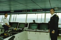 Image of sheet 20020120 photo 27: Personal Bedienung auf dem Kreuzfahrtschiff der Costa Viktoria 
Die Halbinsel Gibraaltar Flughafen 
Ferien Schifffahrt kreuzfahrt Kapitän mit Olivia und   auf Kommandobrücke Schiff ist 250 Meter lang und 32 Meter breit. mit ca 2000 Passagiere
