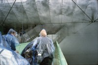 Image of sheet 20020200 photo 15: Die Expo.02 war die 6. Schweizer Landesausstellung und fand vom 15. Mai bis zum 20. Oktober 2002 im Drei-Seen-Land statt. Die Ausstellung bestand hauptsächlich aus fünf Arteplage genannten Ausstellungsgeländen, welche an den Seeufern der Städte Biel/Bienne, Murten, Neuenburg und Yverdon-les-Bains ausschliesslich für die Dauer der Exposition errichtet wurden; die fünfte Arteplage war eine umgebaute Kiesbarke, Arteplage mobile du Jura genannt, die zwischen den restlichen Arteplages verkehrte. Dabei vertrat jede Arteplage einen der fünf Organisations-Kantone Bern, Jura, Freiburg, Neuenburg und Waadt.
Ausflug Expo.02 mit Redaktion der Schweizer Familie Tamedia Schiff nach Neuenburg Sicht vom See 
Balz Fingerhuth Nebel Wolke Yverdon les Bains Plastikmantel Alis Heussler 4 1/2 jährig 2002 

Expo.02 was the 6th Swiss national exposition, which was held from 15 May to 20 October 2002. The exposition took place around the lakes of Neuchâtel, Bienne/Biel and Morat/Murten. It was divided into five sites, which were called Arteplages, due to the proximity of the water (some sites were actually partially or totally built on the water). The five Arteplages were located in Neuchâtel, Yverdon-les-Bains, Morat/Murten, Biel/Bienne and on a mobile barge traveling from one site to another. The barge represented the canton of Jura, which does not have access to any one of the three lakes.