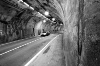 Image of sheet 20020390 photo 34: Ein Fahrzeug Auto Automobile durchquert das Tunnel auf der Gotthardstrasse Schöllenen Richtung Andermatt
Der erste Schweizer Tunnel durch die Alpen, das "Urnerloch" wurde 1707-1708 erbaut und erleichterte das Überqueren des Gotthardpasses. Seine Länge betrug 64 Meter.

Gotthardpassstrasse Gotthard Kanton Uri Schweiz Switzerland 2002 √

© 2002, OLIVIA HEUSSLER / www.clic.li