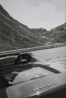 Image of sheet 20020450 photo 20: Gotthardpassstrasse Fahrzeug
Auto Touristen Ferrari Transport Verkehr grosse S-Kurve beim «Mätteli» 
Kanton Uri, Schweiz Switzerland Gottardo 2002 √

aus: Gotthard, das Hindernis verbindet. 
copyright by Olivia Heussler
Exhibition »Via Gotthard«, Leica Camera Galerie Bienne 2003