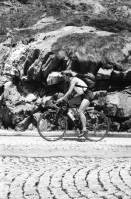 Image of sheet 20020510 photo 14: Gotthard Tremola Kanton Tessin Velofahrer Radfahrer Tanga Badehose Tourist Camper Gallerie Lastwagen Nationalstrasse Brücke Tunnelbelüftung Mauer