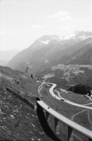 Image of sheet 20020510 photo 25: Gotthard Tremola Kanton Tessin Velofahrer Radfahrer Tanga Badehose Tourist Camper Gallerie Lastwagen Nationalstrasse Brücke Tunnelbelüftung Mauer