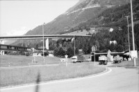 Image of sheet 20020550 photo 11: Airolo Bahnlinie Eingang Zugtunnel Gotthard Lastwagen Fahrradmiete Denkmal für die Opfer des Zugtunnelbau Traforo del Gottardo Ausschnitt