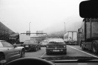 Image of sheet 20020730 photo 4: Autokolonne am Gotthard Suedportal in Airolo Gotthard Nordseite mit Schnee auf Autostrasse 
Badi Enge tische gedeckt Austern stechen bei Suedhang mit mathis pilloud in Zürich
Kiesaushub in amsteg Nordportal Neat  nr. 31 Adolf Ogi gibt interview