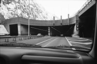 Image of sheet 20020870 photo 1: Eingang Autotunnelportal Nord Tunnel Verkehr Lastwagen Ausgang Sued Leventina Kanton Ticino Aus dem Nobelhotel 'Posta' in Piotta wurde ein Behindertenheim nr. 33 27-34
