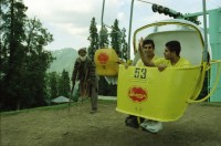 Image of sheet 20030070 photo 30: Car Transport auf der Strasse von der Hauptstadt Islamabad nach Murree M. ist eine Kleinstadt in der Provinz Punjab in Nord-Pakistan Ajubia Park
Ayubia is small town in the Khyber-Pakhtunkhwa province of Pakistan. It is located near the Murree hills and Galyat and is home to Ayubia National Park. It is a very famous tourist destination and includes one of the oldest chair lifts of the area.
Leute Männer und Frauen beim Wasser holen mit Flaschen. Frauen Bäume im Galyat tal
(eine der ältesten) Gondelbahn auch für Familien im National Park. Farige Fahnen und ein Bube mit Blumen Haarschmuck