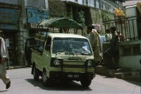 Image of sheet 20030100 photo 29: Ayubia is a small town in the Khyber-Pakhtunkhwa province of Pakistan. It is located near the Murree hills and Galyat and is home to Ayubia National Park. It is a very famous tourist destination and includes one of the oldest chair lifts of the area.
Pakistan Kuzagali: Parkwächter am Eingang zum Ajubia National Park. 23/05/2003 entering Ajubia National Park. Parkguide having a break, in the park you can see rhesus monkeys sitting around.