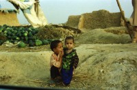Image of sheet 20030180 photo 29: Pakistan Islamabad
Afghans in Pakistan (Urdu: افغان مُہاجر, Muhajir Afghans) are refugees who fled Afghanistan during the 1980s Soviet war in their homeland into Pakistan.[2] As of March 2009, some 1.7 million registered Afghan nationals were reported to be still living in Pakistan. They are allowed to work and attend schools in the country until the end of 2012.[1]
Im Flüchtlingslager Slum F-11 leben seit 1985 55'000- 60'000 afghanische Flüchtlinge. Mädchen Gruppe Junge als Zebra bemalter Esel Maulpferd Die Menschen leben auf den Gräbern der Vorfahren. Wasser Flaschen Melonen Gemüse Kids Kinder geschminkt Frauen mit Kindern Burka Ganzkörperschleier
 Heute stehen auf dem Gelände des ehemaligen Flüchtlingslager moderne teure Wohnungen zum Kauf angeboten