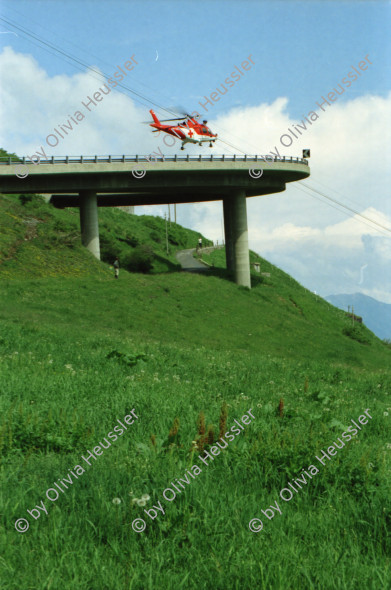 Image of sheet 20030260 photo 30: Göschenen Gotthard Bahntunnel Bahnhof Lokomotive Cargo DHL Wagon Brücke Lastwagen Stau Alis und Raoul Batantu Gordevio mit Rosen Das historische Zollhaus Dazio Grande ist heute Kulturzentrum und Restaurant und Hotel 
Autostrasse oberhalb Motto Bartola Rega Lawinengalerie
Der Gotthardtunnel oder auch Gotthard-Scheiteltunnel ist der Scheiteltunnel der Gotthardbahn und verläuft unter dem Sankt-Gotthard-Pass durch das Schweizer Gotthardmassiv. Der 15 003 Meter lange Eisenbahntunnel besteht aus einer einzelnen, doppelgleisig ausgebauten Tunnelröhre zwischen den Ortschaften Göschenen im Kanton Uri und Airolo im Kanton Tessin.