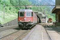 Image of sheet 20030270 photo 4: Göschenen Gotthard Bahntunnel Bahnhof Lokomotive Brücke Lastwagen Stau 
Autostrasse oberhalb Motto Bartola Rega Lawinengalerie Unfall  Tremola Stau Kurve Nationalstrasse 
Der Gotthardtunnel oder auch Gotthard-Scheiteltunnel ist der Scheiteltunnel der Gotthardbahn und verläuft unter dem Sankt-Gotthard-Pass durch das Schweizer Gotthardmassiv. Der 15 003 Meter lange Eisenbahntunnel besteht aus einer einzelnen, doppelgleisig ausgebauten Tunnelröhre zwischen den Ortschaften Göschenen im Kanton Uri und Airolo im Kanton Tessin.