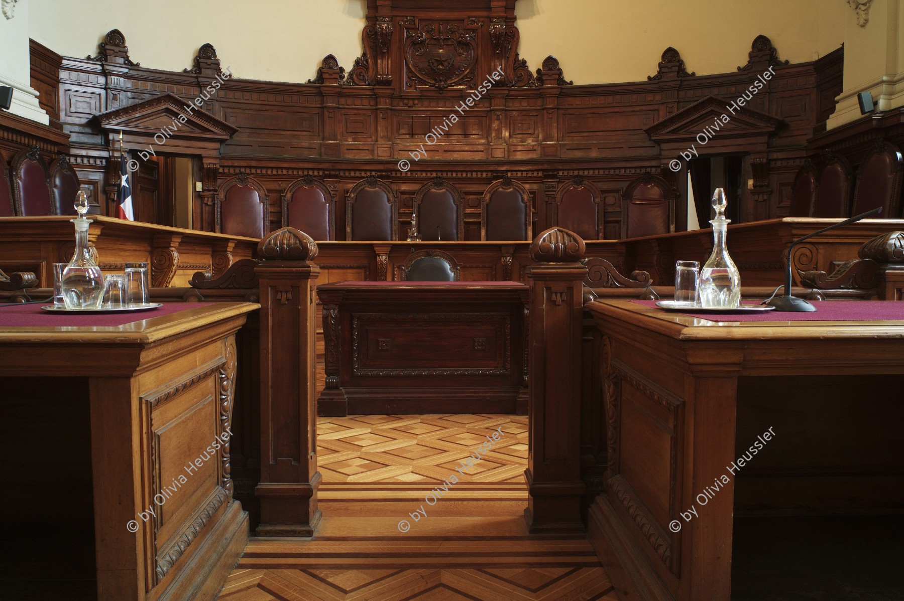 Image of sheet 20051207 photo 42: The Palacio de los Tribunales de Justicia de Santiago (English: Courts of Justice Palace of Santiago) is the building housing the Supreme Court of Chile

Courtroom at the main court in Santiago de Chile where one of the cases against former President and Dictator is being heard.
General Augusto Pinochet was indicted for human rights violations committed in his native Chile by Spanish magistrate Baltasar Garzón on 10 October 1998. He was arrested in London six days later and held for a year and a half before finally being released by the British government in March 2000