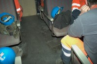 Image of sheet 20110208 photo 934: Gotthard Neat Neue Alpentransversale Bahntunnel. Bahnarbeiter fahren  im Arbeiterzug durch das Südportal, zur Baustelle im Tunnel bei Bodio, Kanton Tessin Schweiz Svizzera Switzerland 2011 √