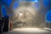 Image of sheet 20110323 photo 541: Miners celebrate after the tunnel drilling machine "Heidi" breaks through the last section of the Gotthard Base Tunnel West near Sedrun in the canton of Grisons, Switzerland, Wednesday, March 23, 2011. 
..Die Mineure feiern nach dem 2. Hauptdurchschlag im Gotthardbasistunnel in Sedrun, vor der Tunnelbohrmaschine "Heidi" Mittwoch, 23. Maerz 2011. Wie geplant sind am Mittwoch die letzten Meter Fels im Gotthard-Basistunnel durchstossen worden. Rund fuenf Monate nach dem Durchschlag der Ostroehre ist damit auch die Westroehre zwischen Erstfeld und Bodio auf der gesamten Laenge von 57 Kilometern ausgebrochen. Kanton Graubünden √