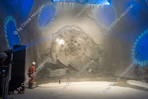 Image of sheet 20110323 photo 541: Miners celebrate after the tunnel drilling machine "Heidi" breaks through the last section of the Gotthard Base Tunnel West near Sedrun in the canton of Grisons, Switzerland, Wednesday, March 23, 2011. 
..Die Mineure feiern nach dem 2. Hauptdurchschlag im Gotthardbasistunnel in Sedrun, vor der Tunnelbohrmaschine "Heidi" Mittwoch, 23. Maerz 2011. Wie geplant sind am Mittwoch die letzten Meter Fels im Gotthard-Basistunnel durchstossen worden. Rund fuenf Monate nach dem Durchschlag der Ostroehre ist damit auch die Westroehre zwischen Erstfeld und Bodio auf der gesamten Laenge von 57 Kilometern ausgebrochen. Kanton Graubünden √