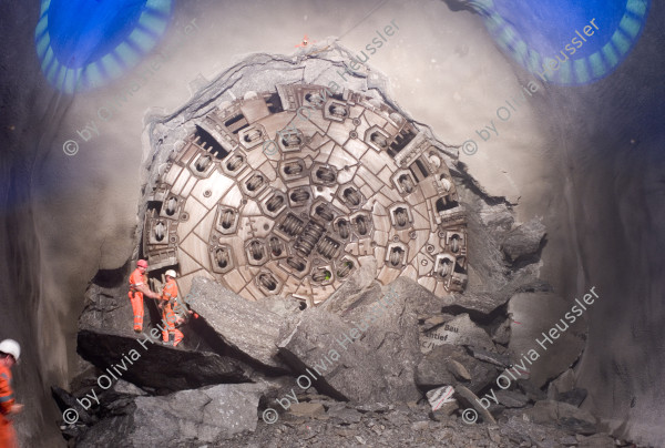 Image of sheet 20110323 photo 543: Miners celebrate after the tunnel drilling machine "Heidi" breaks through the last section of the Gotthard Base Tunnel West near Sedrun in the canton of Grisons, Switzerland, Wednesday, March 23, 2011.
..Die Mineure feiern nach dem 2. Hauptdurchschlag im Gotthardbasistunnel in Sedrun, vor der Tunnelbohrmaschine "Heidi" Mittwoch, 23. Maerz 2011. Wie geplant sind am Mittwoch die letzten Meter Fels im Gotthard-Basistunnel durchstossen worden. Rund fuenf Monate nach dem Durchschlag der Ostroehre ist damit auch die Westroehre zwischen Erstfeld und Bodio auf der gesamten Laenge von 57 Kilometern ausgebrochen. Kanton Graubünden √