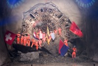 Image of sheet 20110323 photo 548: Miners celebrate after the tunnel drilling machine "Heidi" breaks through the last section of the Gotthard Base Tunnel West near Sedrun in the canton of Grisons, Switzerland, Wednesday, March 23, 2011.
..Die Mineure feiern nach dem 2. Hauptdurchschlag im Gotthardbasistunnel in Sedrun, vor der Tunnelbohrmaschine "Heidi" Mittwoch, 23. Maerz 2011. Wie geplant sind am Mittwoch die letzten Meter Fels im Gotthard-Basistunnel durchstossen worden. Rund fuenf Monate nach dem Durchschlag der Ostroehre ist damit auch die Westroehre zwischen Erstfeld und Bodio auf der gesamten Laenge von 57 Kilometern ausgebrochen. Kanton Graubünden √