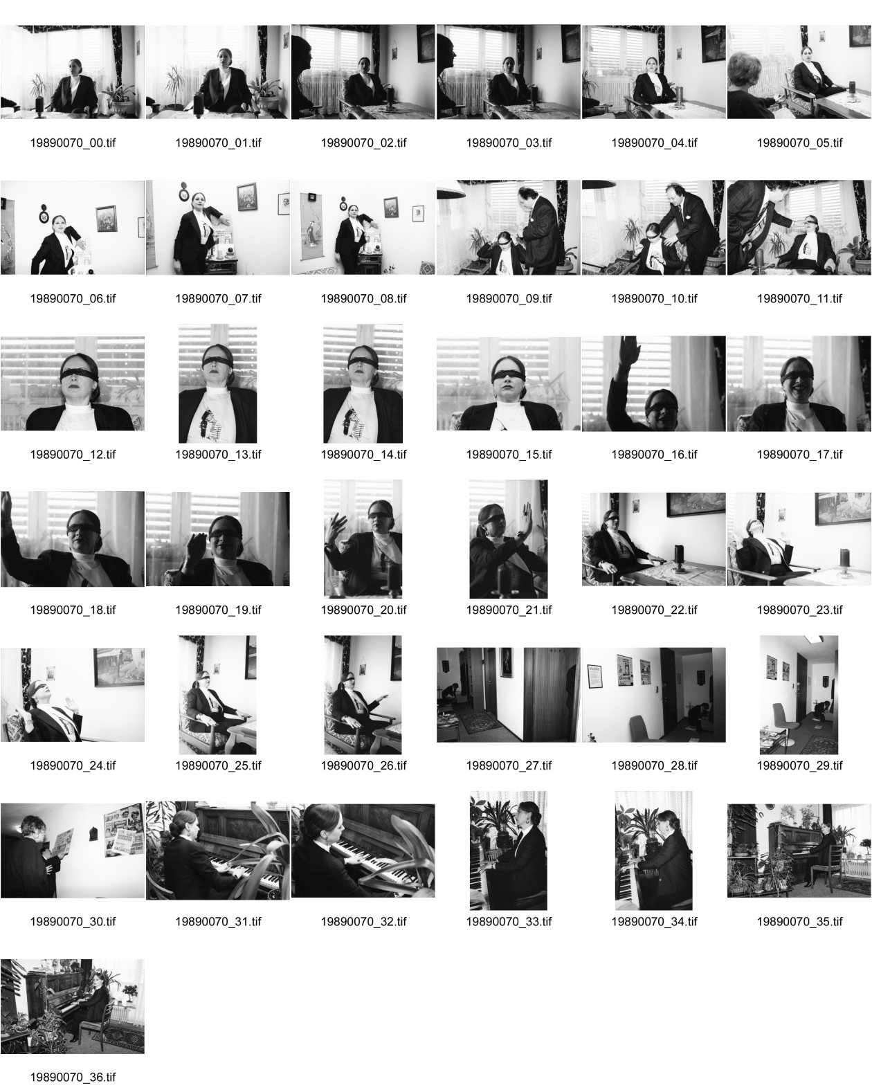 Image of sheet 19890070: Die Hellseherin Dagmar Hoffmann bei sich zu Hause posiert Mit verbundenen Augen sitzt sie da und hebt die Hand. Am Piano und ihre Artikel suchend, auf dem Boden kniend. Ihr Mann und Manager assistiert ihr beim Augenbinden anlegen. Sie zeigt ihre Artikel, die sie eingerahmt hat. Sie hält ihre Hand zum Hitlergruss!

Springer Verlag Zeitung Journal für die Frau
Deutschland 1989 Sekten Spiritualismus

Die Hellseherin Dagmar Hoffmann bei sich zu Hause posiert 
Springer Verlag Zeitung Journal für die Frau 
Deutschland 1989 Sekten Spiritualismus