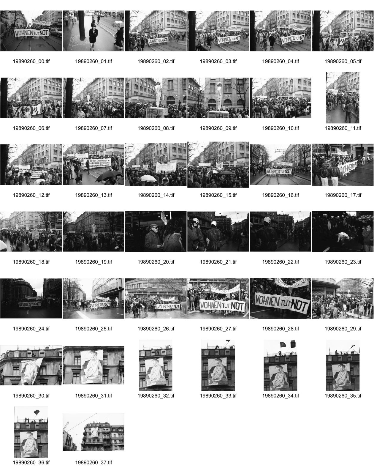 Image of sheet 19890260: 'Wohnen tut Not' 18.3.89  Wohnungsnot demonstration an der Bahnhofstrasse Tomo Thomas Muscionico Portrait. Grosses Spekulanten Transparent am Stauffacher. Tor zu Aussersihl. Mann isst Haus. Spekulant. Karthago Zürich Kreis 4 1989