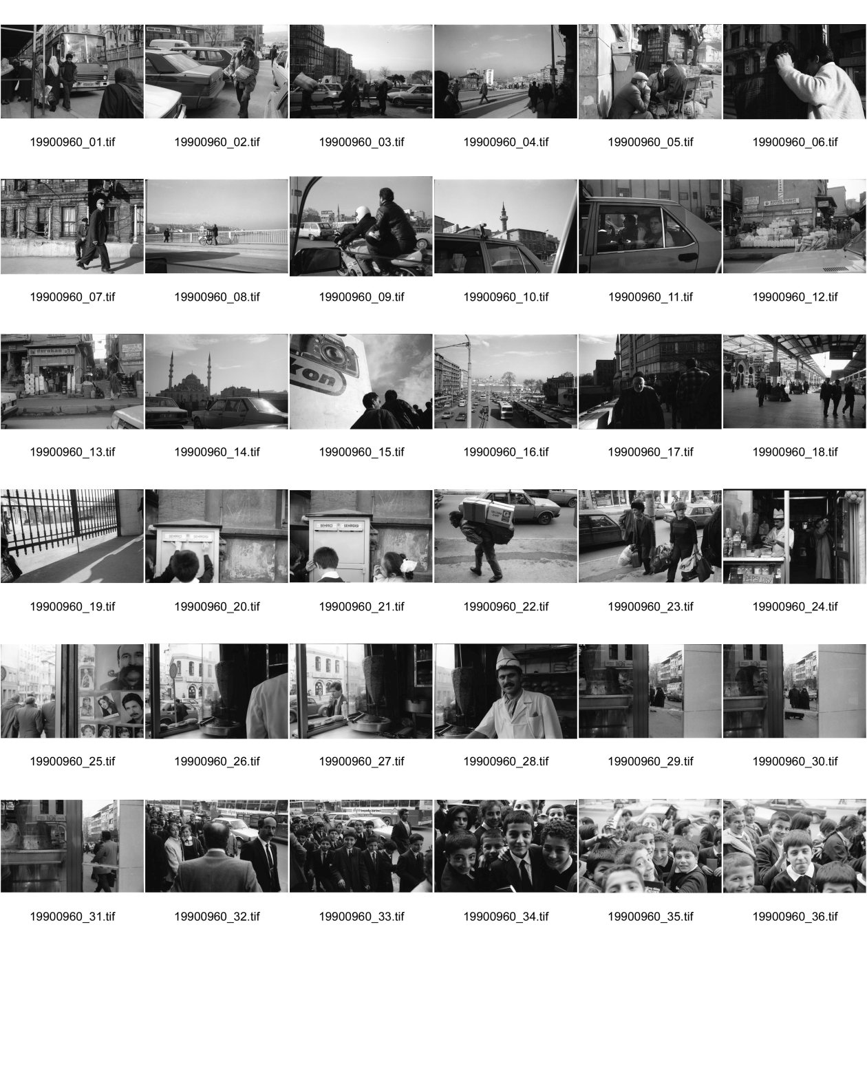 Image of sheet 19900960: Strassenszenen Moschee. zwei alte Männer. Nikon Tafel. Bahnhof. Schnurrbart Schnautzmänner Schaufenster. Kebab Stand. Ein muslimisch fundamentalistisches Paar. Briefkasten und Kinder. Mann schleppt grosse Ladung auf Rücken. Bulgarinnen kaufen ein. Junge Gruppe Schulkinder. Spiegelungen. 1990 Türkei Istanbul