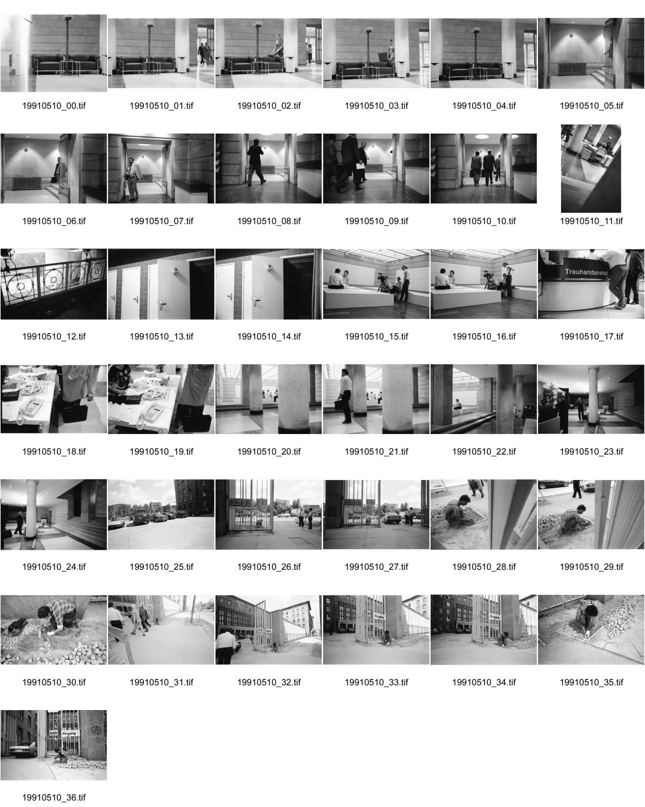 Image of sheet 19910510: frtsg. 910500 ehem. Reichsluftfahrtministerium, Haus der Ministerien DDR, Treuhandanstalt und heute Bundesfinanzamt an der Wilhelmstrasse in Berlin.
Eingang Türkischer Fremdarbeiter legt Pflästerer Pflastersteine. Olivia. 
A Turkish worker is setting paving-stones in front of the German trust-company whilest an employee of the company is leaving the area of the firm. The German trust-company got its reputation due to its job, having to integrate firms of Eastgermany GDR into the Western capitalist economic system. 1991 Berlin Germany Deutschland DDR