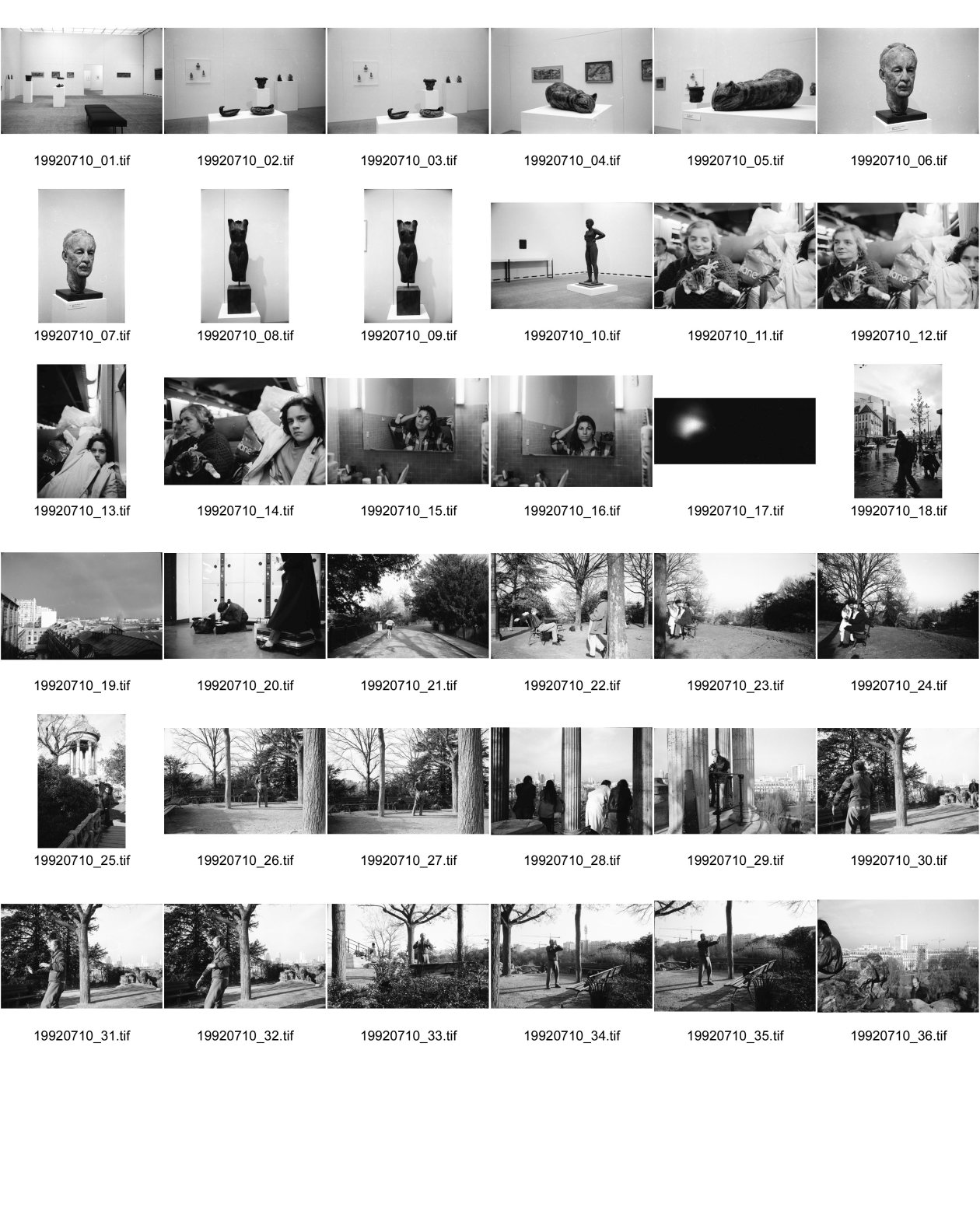 Image of sheet 19920710: Ausstellung Alis Guggenheim im Kunsthaus Aarau. Plastiken. Familie mit Katz und Pack im Zug nach Paris. Selbstportrait Spiegel Cité in Paris Olivia. Mit Portrait Dominique Meienberg Fotograf und Cousin von schriftsteller Niklaus Meienberg. im Parc  des Buttes Chaumont. Aikido Mensch Japaner macht Aikido Uebungen Hintergrund Dächer von Paris. Farbiges Liebespaar Junge Sonnen sich.  France Frankreich 1992