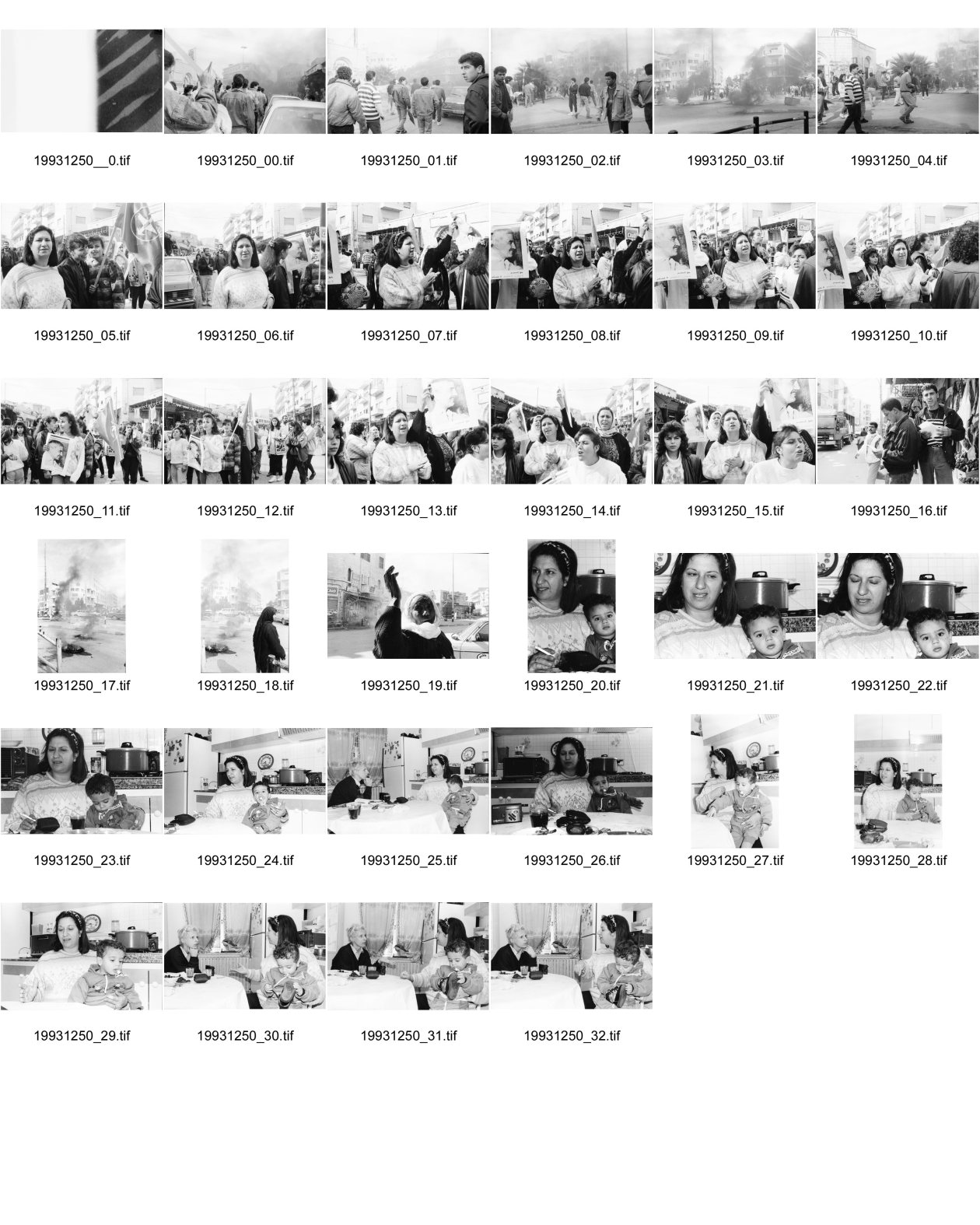 Image of sheet 19931250: Portrait Maha Nasser an Demo zum 26. Geburtstag von Georges Habasch's PLFP Frauen tragen sein Portrait People's Liberation Front of Palestine. in Ramallah West Bank Tränengas Einsatz brennende Autoreifen . Esther Woerdehoff im Gespräch mit Maha zu Hause mit ihrem jüngsten Sohn Husem 1 1/2 jährig. Auf Transpi Color Long life the Pop. Front at his Aniversery. Ramallah Palestine Palästina 1993