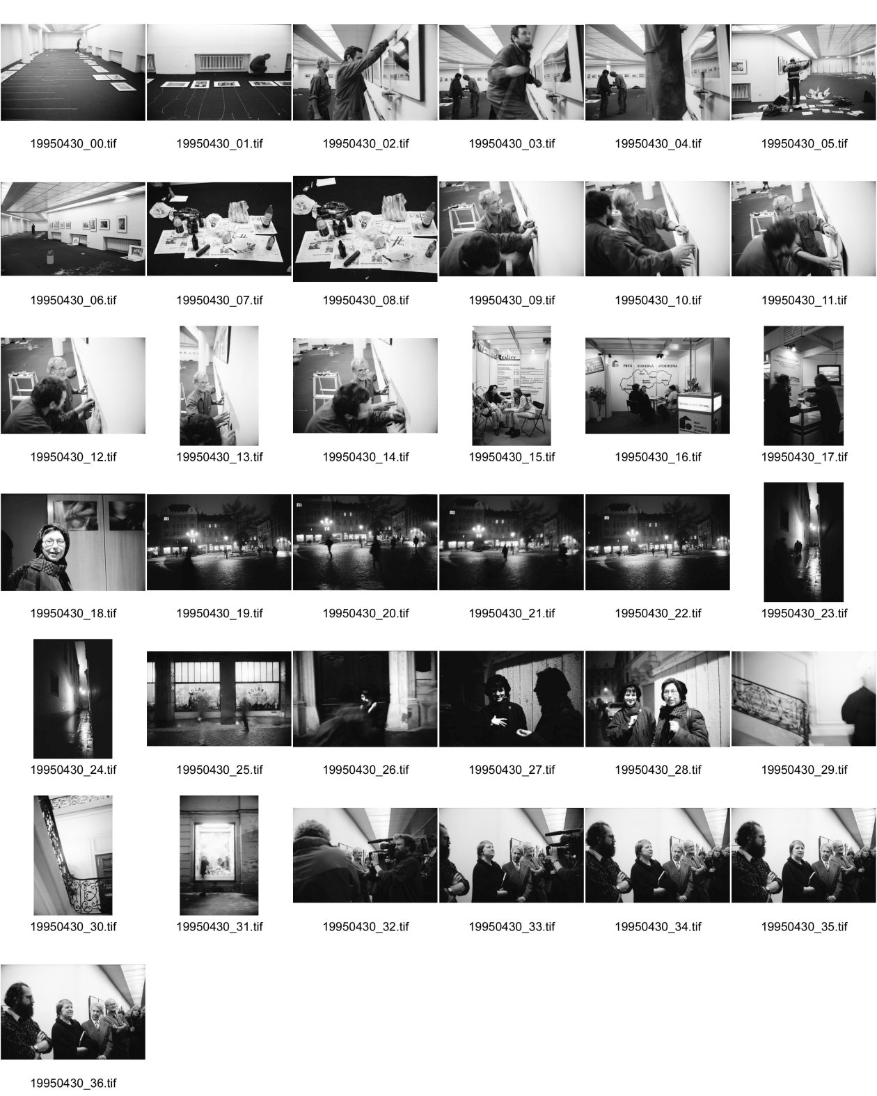 Image of sheet 19950430: Josef Joseph Koudelka hängt seine Ausstellung. Ausstellung Immobilienmark Altstadt inder Nacht Café Roland Eröffnung der Foto Photo Ausstellung von Josef Koudelka re. und Vaclav Macek li. Iren Stehli Bratislava Slowakei Slowaqia Slowakia 1995