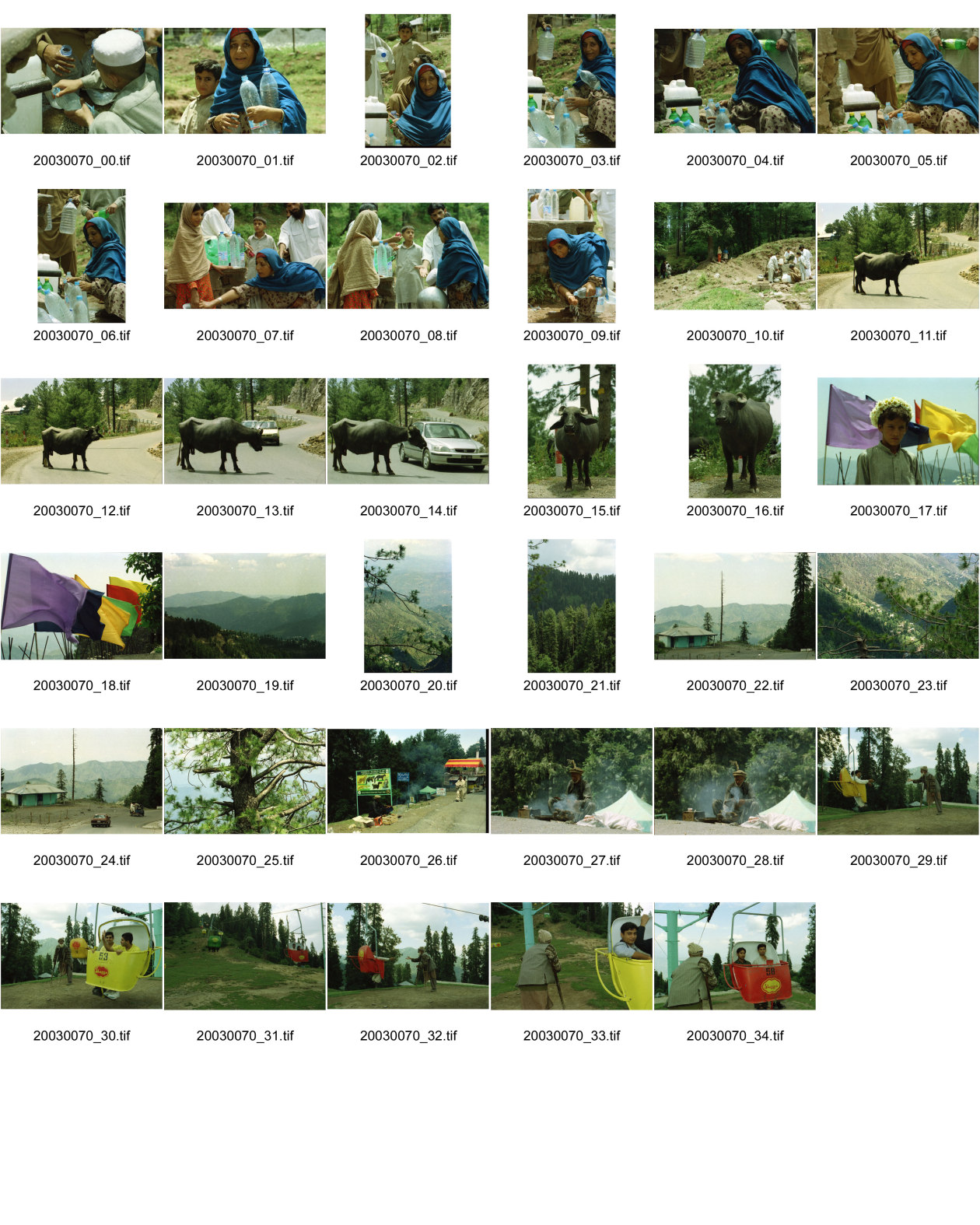 Image of sheet 20030070: Car Transport auf der Strasse von der Hauptstadt Islamabad nach Murree M. ist eine Kleinstadt in der Provinz Punjab in Nord-Pakistan Ajubia Park
Ayubia is small town in the Khyber-Pakhtunkhwa province of Pakistan. It is located near the Murree hills and Galyat and is home to Ayubia National Park. It is a very famous tourist destination and includes one of the oldest chair lifts of the area.
Leute Männer und Frauen beim Wasser holen mit Flaschen. Frauen Bäume im Galyat tal
(eine der ältesten) Gondelbahn auch für Familien im National Park. Farige Fahnen und ein Bube mit Blumen Haarschmuck